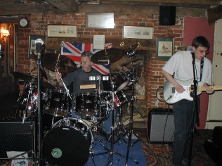 hey look, you can actually see Martin behind his drums