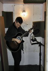 Ren plays guitar